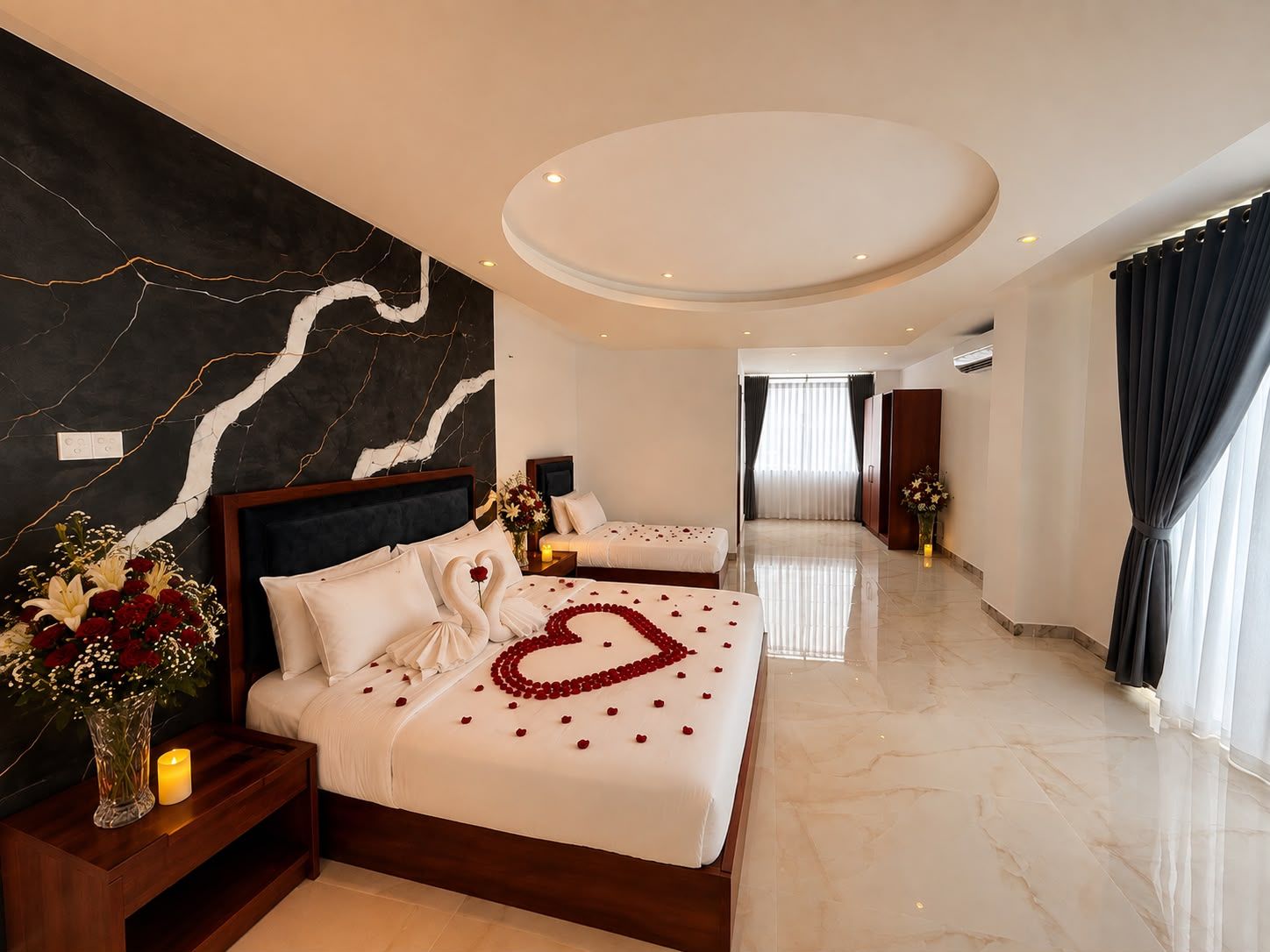 A hotel room with two beds, a marble floor, a large mirror, and a modern ceiling design.