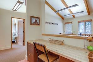 A room with a desk, chair, and a large mirror. There is a door leading to another room, a picture on the wall, and a window with blinds. - 2 Mi to Sun Valley Resort! Upscale Mtn-View Home (Ketchum)