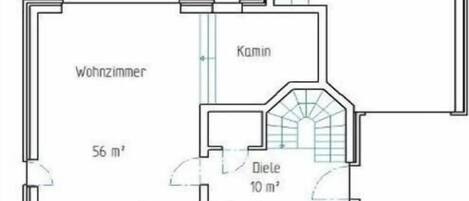 A floor plan with a living room, kitchen, dining area, and a garage.