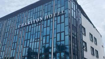 A modern building with the sign 'CHARITON HOTEL' indicating it is a hotel.