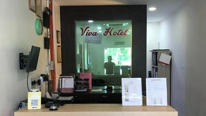 A reception desk with a sign reading 'Viva Hotel' in the background. - Viva Hotel SRI Aman (Sri Aman)