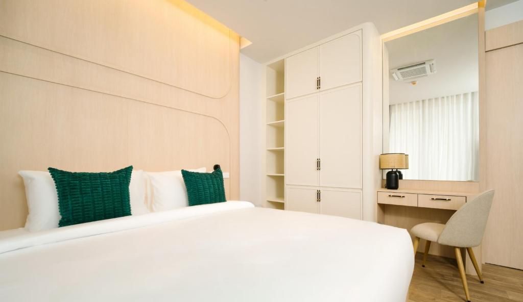 Deluxe Triple Room, Multiple Beds, Balcony, Pool View | Blackout drapes, iron/ironing board (on request), WiFi (free)