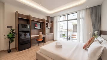 Estudio ejecutivo, vistas a la ciudad | Escritorio, wifi gratis, ropa de cama