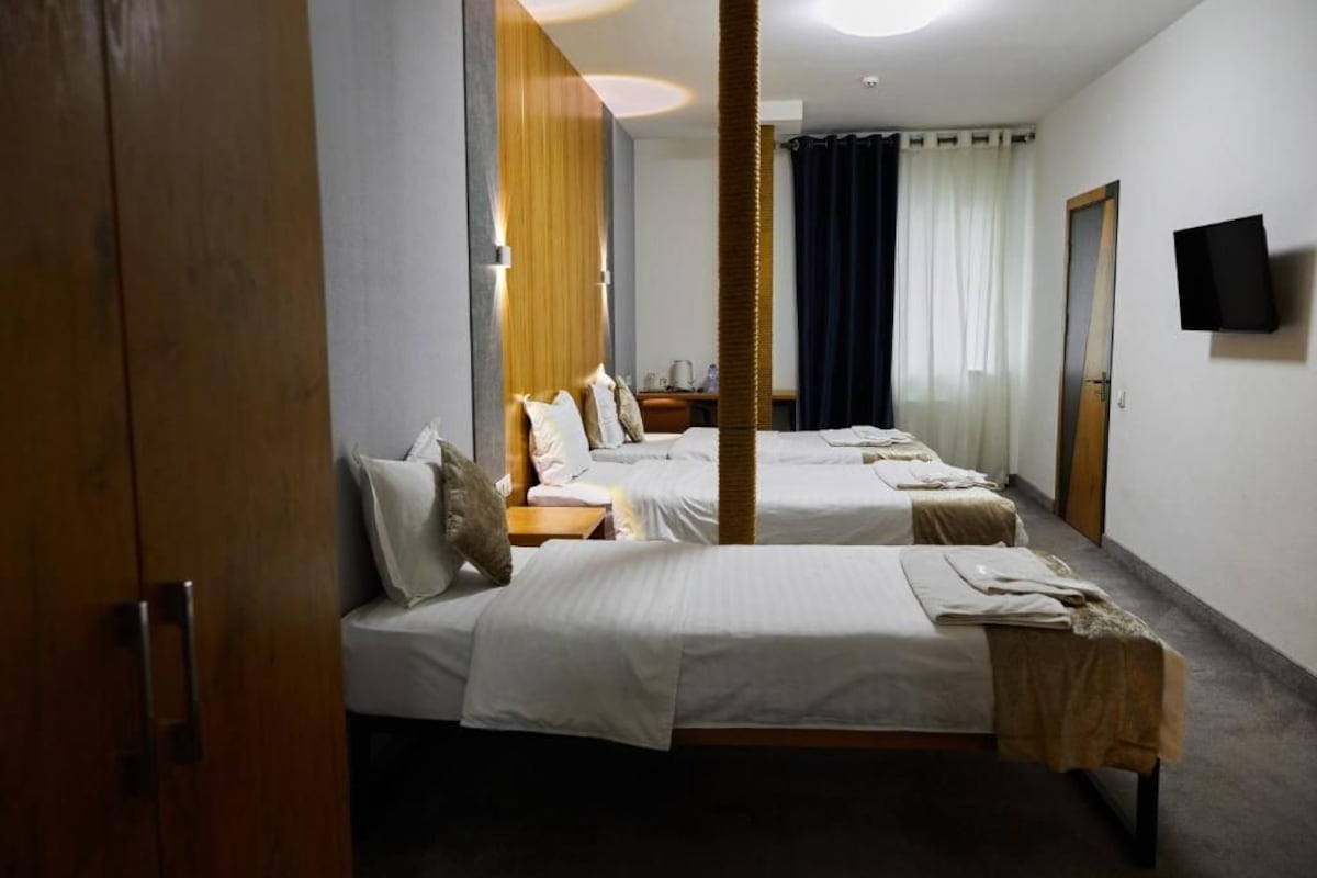 Standard Triple Room, City View | Soundproofing, free cots/infant beds, free WiFi, bed sheets