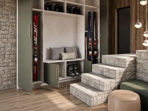 A ski storage area with skis, a bench, and a staircase. - Modern chalet, pets welcome - 16 guests by the slopes (Vars)