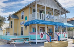 A creamery building with a blue awning and a sign that reads "Blue Mountain Beach Creamery." - 3 Bedroom Condo with Gulf Views on 30A (Santa Rosa Beach)