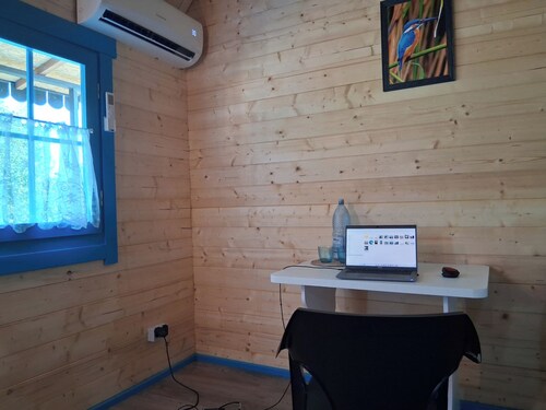 Cozy 1-bedroom bungalow in tranquil Mila 23 with AC