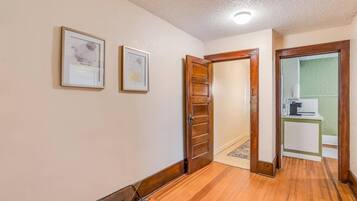 Charming hallway with hardwood floors and classic woodwork