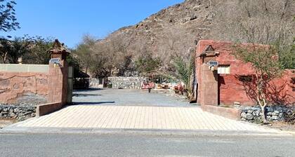 Spacious 4-bedroom bamboo farmhouse in tranquil Ras Al Khaimah with AC