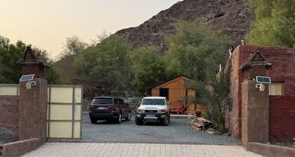 Spacious 4-bedroom bamboo farmhouse in tranquil Ras Al Khaimah with AC