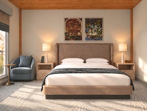 A hotel room with a large bed, two bedside tables, a chair, and artwork on the wall. - Sabal House (Savannah)