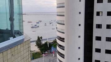 Peek out to the coastline from your high-rise perch.