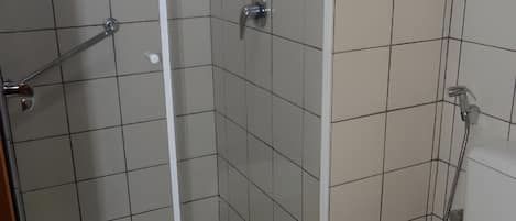 Rinse off comfortably in a simple, practical walk-in shower.