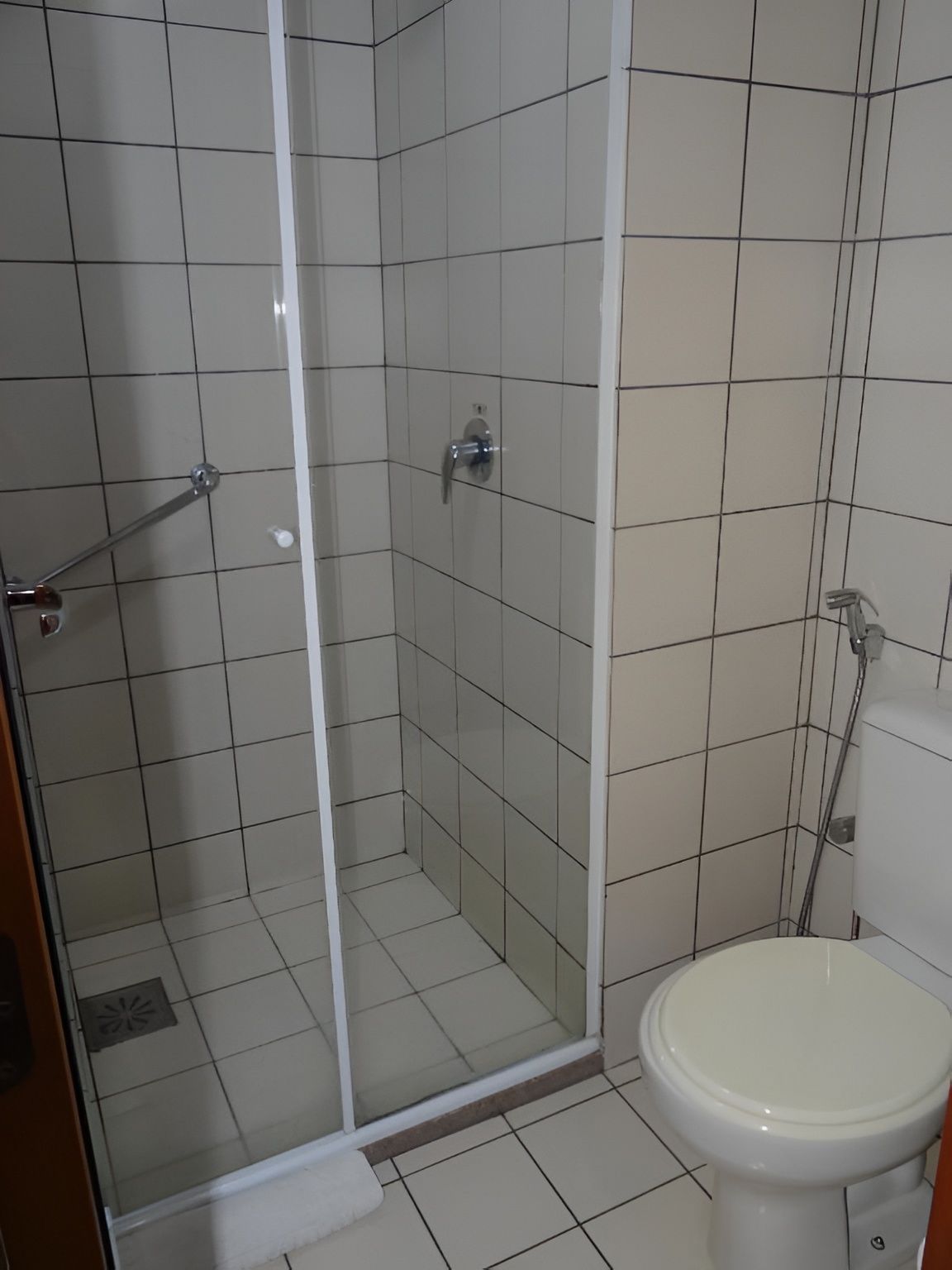 Rinse off comfortably in a simple, practical walk-in shower.