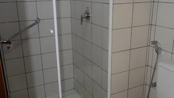 Rinse off comfortably in a simple, practical walk-in shower.