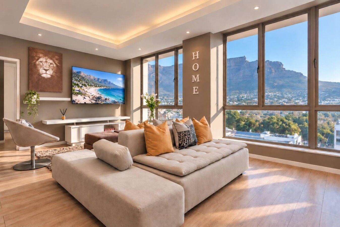 A modern living room with a large window, a sofa, a TV, and a wall-mounted artwork.