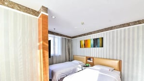 A hotel room with two beds, a wooden accent wall, a painting, and a window with curtains. - Super 8 Quanzhou Anxi Longhu (Quanzhou)