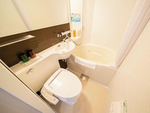 A bathroom with a toilet, sink, and bathtub. - Super Hotel Totsuka Eki Higashiguchi (Yokohama)