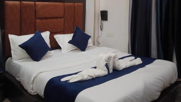 Unclassified image, 1 of 5, button - blue heart guest house (loni gzb)