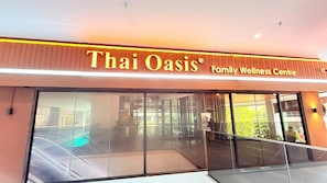 A Thai Oasis Family Wellness Centre with a large glass facade. - Trion KL Premier Residence (Kuala Lumpur)