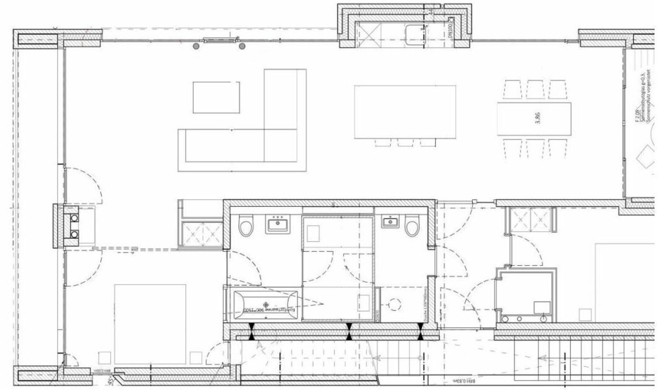 Un plan d’étage comprenant un espace de vie central, une cuisine, deux chambres et une salle de bain.