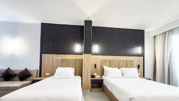 Deluxe Room, Balcony | In-room safe, blackout curtains, iron/ironing board (on request)