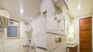 A bathroom with a shower, toilet, sink, and a wooden door. - Hotel Rise Free Airport Pickup  (New Delhi)