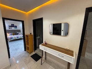 A modern bathroom with a vanity, mirror, and a shower area. - 6-bedroom apartment in superb Dakar with cool AC comfort (Dakar)