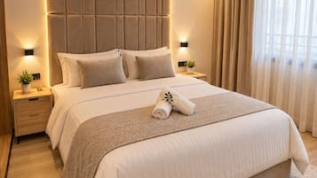 Tabla de planchar con plancha, wifi gratis, ropa de cama
