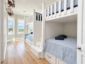 Bedroom 2 - two Queen-over-Queen bunks provide four queen mattresses, sleeping eight; private Bathroom 2. - Bayfront, Private Elevator, Game Room, Sleeps 18 (Freeport)