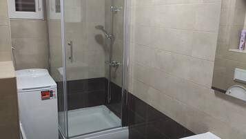 Apartment, Balcony, Sea View | Bathroom | Shower, hair dryer, towels, soap