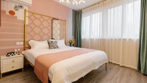 A bedroom with a bed, bedside table, and curtains. - Tonight Homestay Taikoo Hui Shanghai (SHANGHAI)