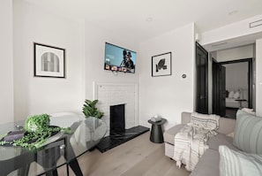 Living area - Stylish West End Apt, Cozy City Retreat! (Toronto)