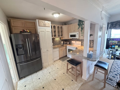 Stunning Lake Winnipesaukee Views, 2BR + Pool, Walk to Weirs Beach