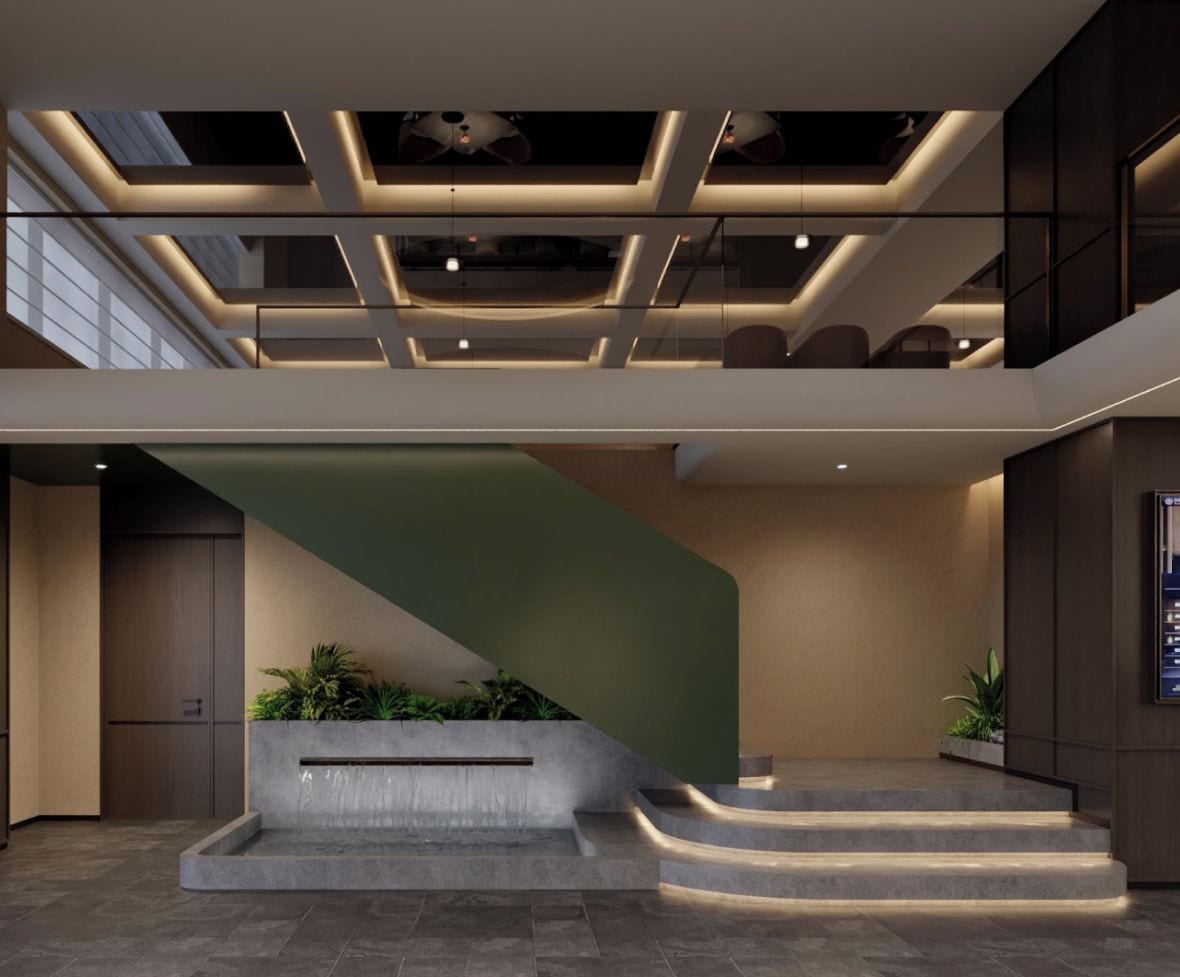 A modern interior with a staircase, recessed lighting, and a plant wall.