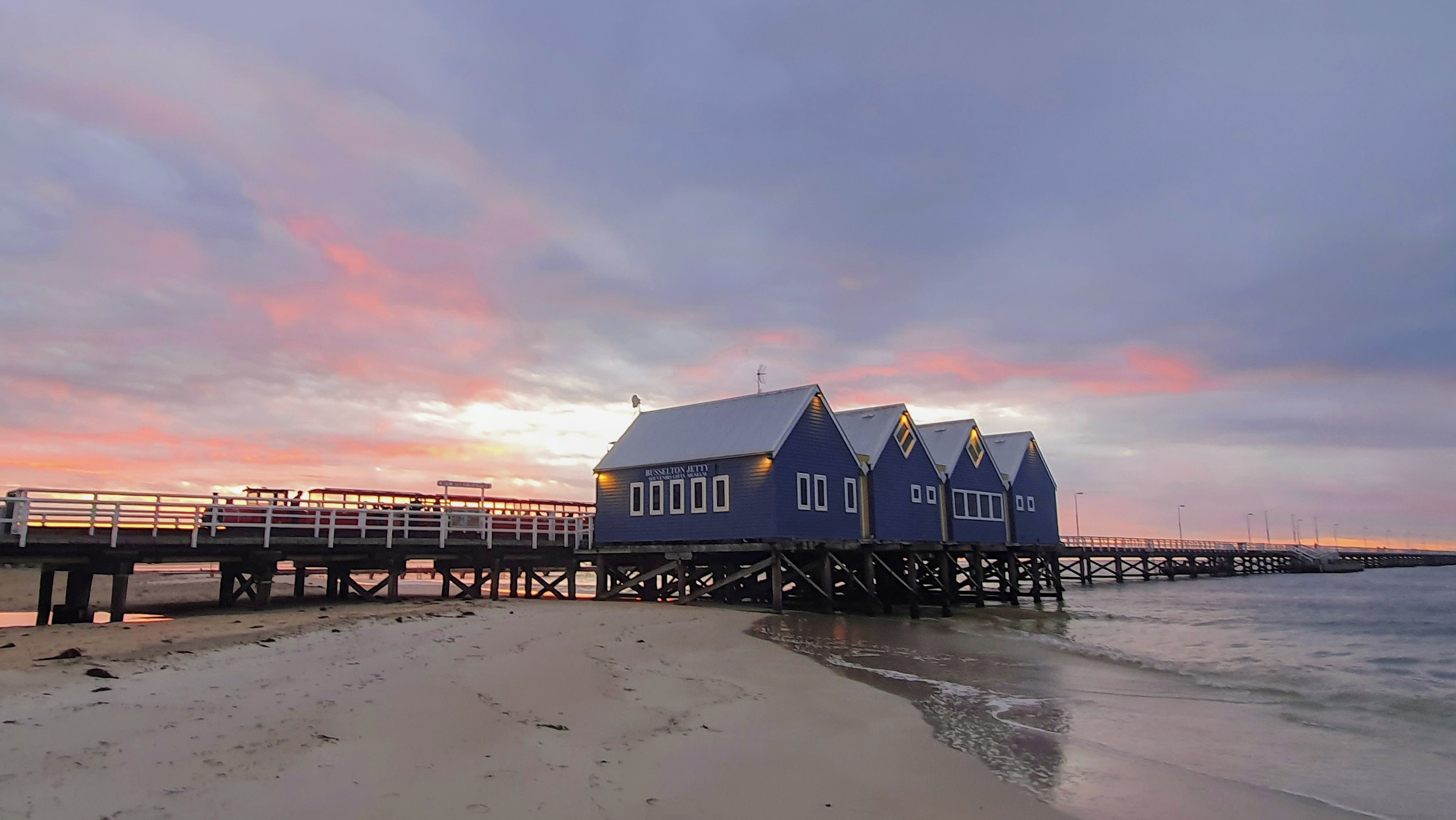 A waterfront property with a pier and overwater structures.