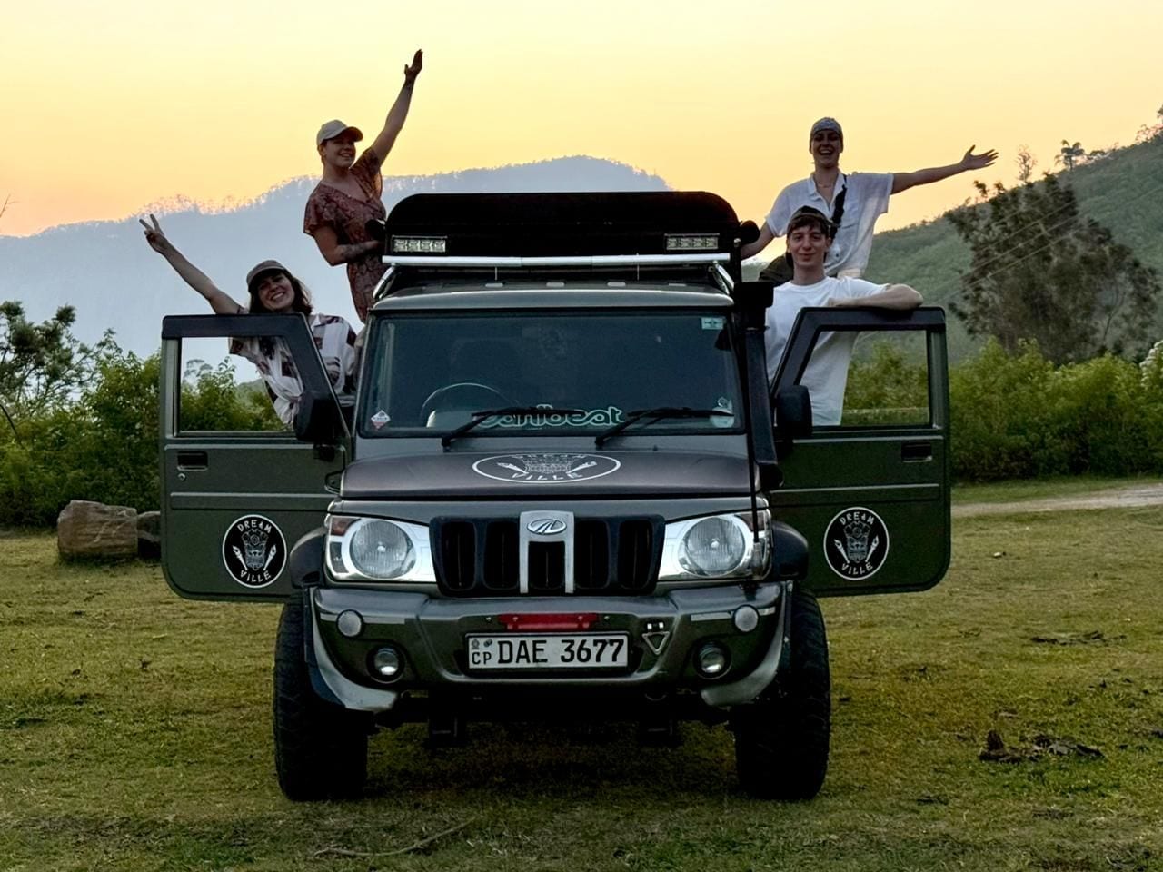 A vehicle with a roof rack and a license plate.