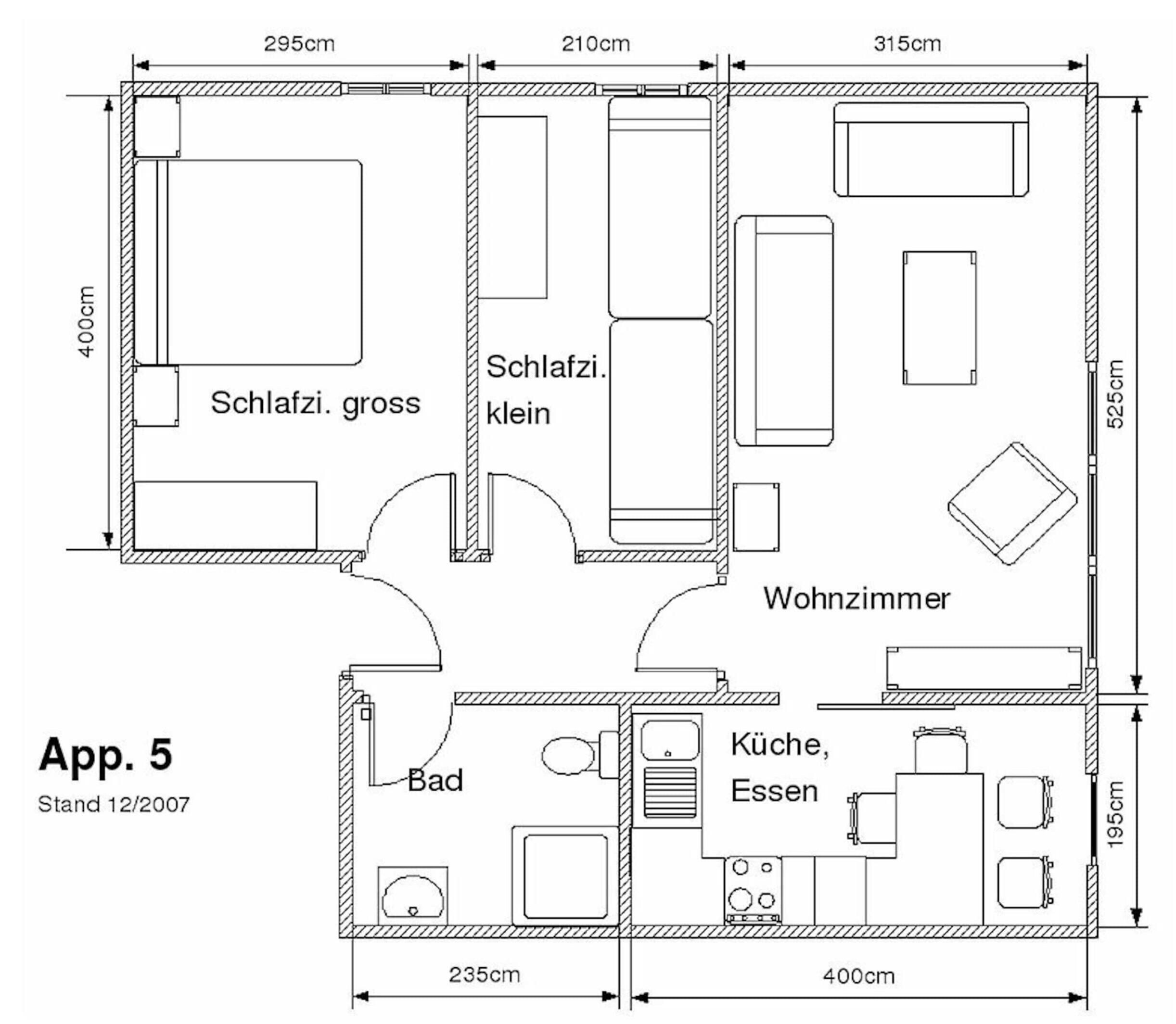A floor plan with a living room, kitchen, bathroom, and two bedrooms.
