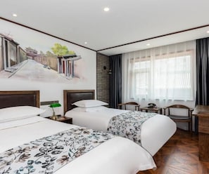 A hotel room with two beds, a mural on the wall, a window with sheer curtains, and a small table with a telephone. - Time Walk Nostalgic Theme Hotel Beijing Prince Gongfu (Beijing)