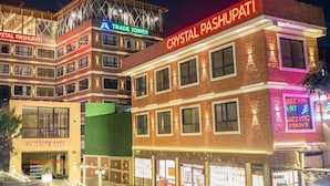 A multi-story building with signage for 'Crystal Pushupatti' and 'Crystal Bakes.' - Hotel Crystal Pashupati (Kathmandu)