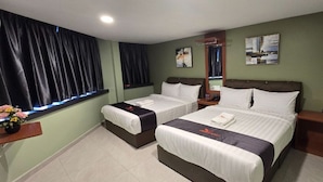 A hotel room with two beds, a nightstand, a mirror, and a window with curtains. - Enrich Hotel Semenyih (Semenyih)