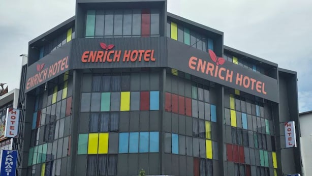 A modern hotel building with 'ENRICH HOTEL' signage on the facade. - Enrich Hotel Semenyih (Semenyih)