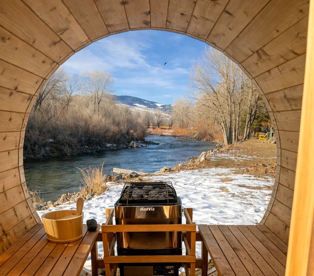 A wooden structure with a view of a river and mountains.