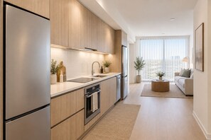 Studio | Cuisine privée | Réfrigérateur, four à micro-ondes, un four, surface de cuisson