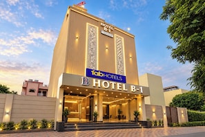 A hotel with a prominent entrance, a sign indicating 'HOTEL B-1', and a 'fabHOTELS' logo. - Fabhotel B1 (Indore)