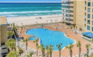 A hotel with a pool, beach, and ocean view. - Tidewater 1605- Sunset Dreams (Panama City Beach)