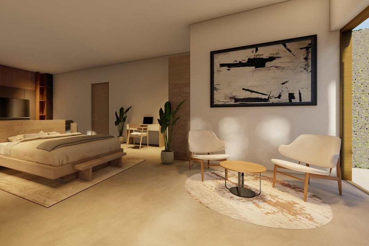 Un dormitorio moderno con una cama grande, mesitas de noche, un televisor y un cuadro en la pared.