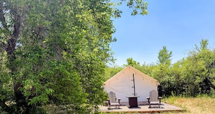 13 Acres. Animas River. One Safari Tent. Come Stay Awhile.