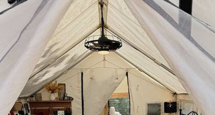 13 Acres. Animas River. One Safari Tent. Come Stay Awhile.