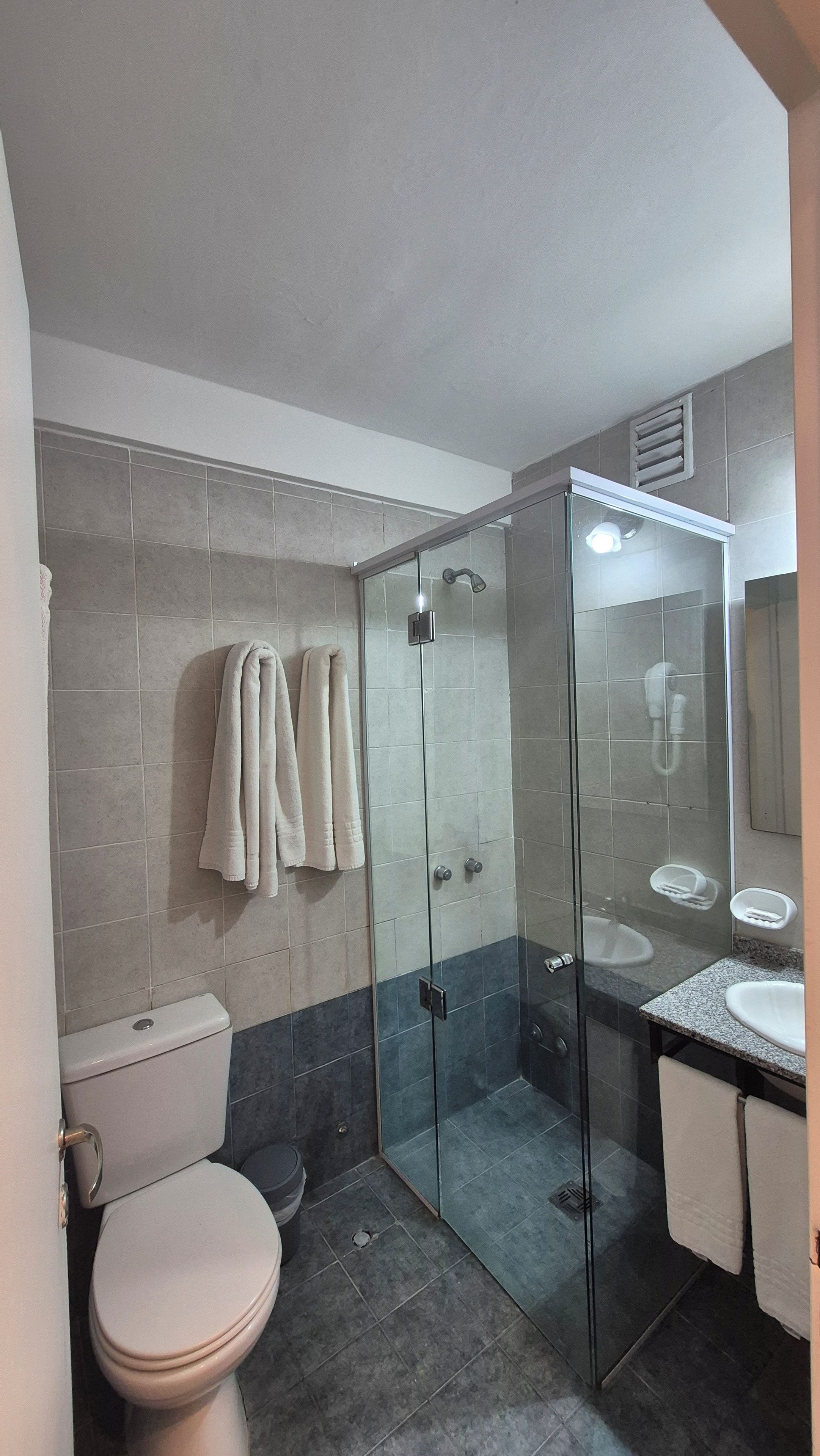 Standard Room | Bathroom | Shower, hair dryer, towels, soap